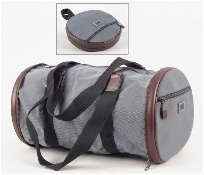 SALVATORE FERRAGAMO LEATHER AND NYLON COLLAPSIB: SALVATORE FERRAGAMO LEATHER AND NYLON COLLAPSIBLE DUFFLE BAG. With dust bag Open: 9" x 17.5"