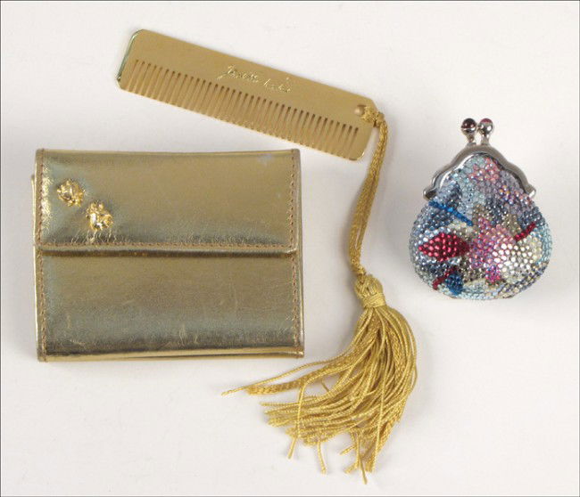JUDITH LEIBER RHINESTONE PILL BOX.: JUDITH LEIBER RHINESTONE PILL BOX. Together with a Judith Leiber gold leather wallet and comb