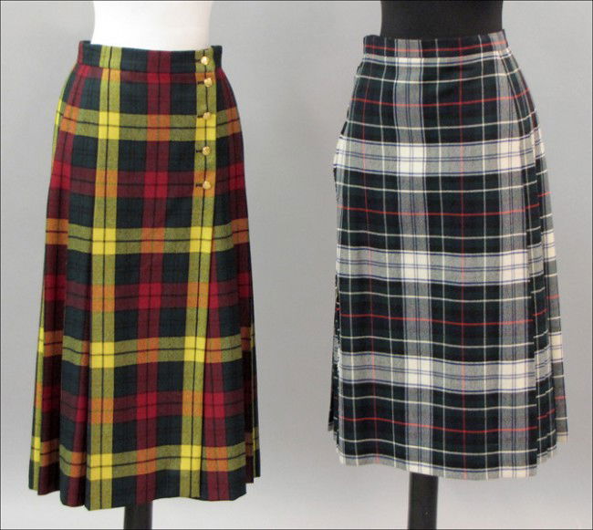 BURBERRY PLAID KILT STYLE WOOL SKIRT.: BURBERRY PLAID KILT STYLE WOOL SKIRT. Together with an Escada wool knife pleat skirt with brass buttons Both skirts are size 10