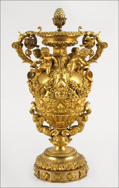FRENCH DORE BRONZE URN.: FRENCH DORE BRONZE URN. Highly decorated with putti, masks and foliate scrollwork Height: 26.25"