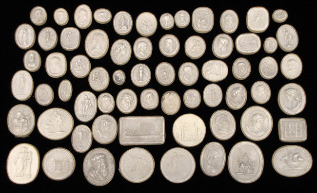 MINIATURE PLASTER CAMOES.: MINIATURE PLASTER CAMOES. A souvenir of the Grand Tour, depicting famous sculptures and work of art from Eyptian carvings thru neoclassicism