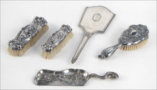 ART NOUVEAU STERLING SILVER THREE-PIECE VANITY: ART NOUVEAU STERLING SILVER THREE-PIECE VANITY SET. Together with a sterling silver hand mirror, and an art nouveau silverplate crumber