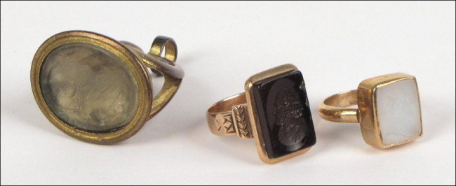 TWO SHAKESPEARE INTAGLIO RINGS.: TWO SHAKESPEARE INTAGLIO RINGS. Together with a Shakespeare watch fob