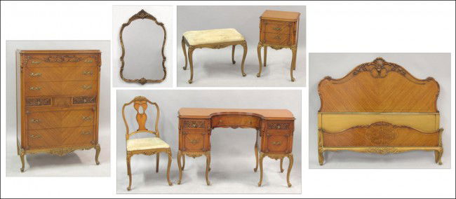 CARVED AND GILT MAHOGANY BEDROOM SET.: CARVED AND GILT MAHOGANY BEDROOM SET. Comprised of a five drawer chest [53" x 36" x 21], headboard [50" x 59], footboard, two side rails [length: 76"], nighstand [27" x 16" x 14"], mirror [40" x 25"],