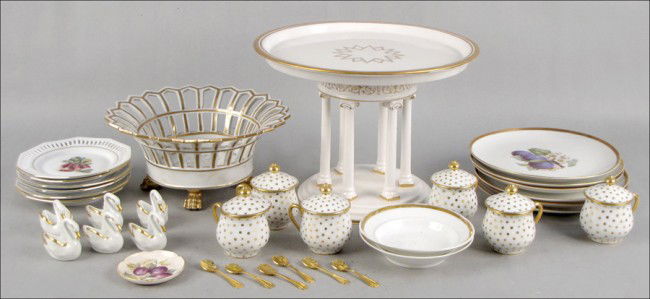 SET OF SIX HUTSCHENREUTHER GILT PORCELAIN PLATE: SET OF SIX HUTSCHENREUTHER GILT PORCELAIN PLATES. Together with a set of six Limoges gilt porcelain pots de creme, six Limoges gilt porcelain swan form salt cellars with salt spoons, one Italian gilt