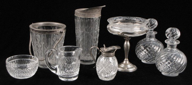 VAL ST. LAMBERT ICE BUCKET AND COCKTAIL SHAKER.: VAL ST. LAMBERT ICE BUCKET AND COCKTAIL SHAKER. Together with a Waterford crystal creamer and sugar, a pair of cut glass bottles, a crystal syrup pitcher, and a weighted sterling silver compote