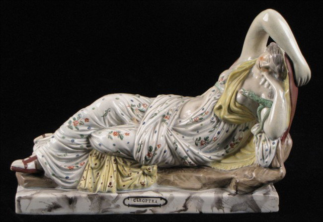 STAFFORDSHIRE PEARLWARE RECLINING CLEOPATRA, ON: STAFFORDSHIRE PEARLWARE RECLINING CLEOPATRA, ON MARBLED BASE. Height: 7.5", Length: 10"