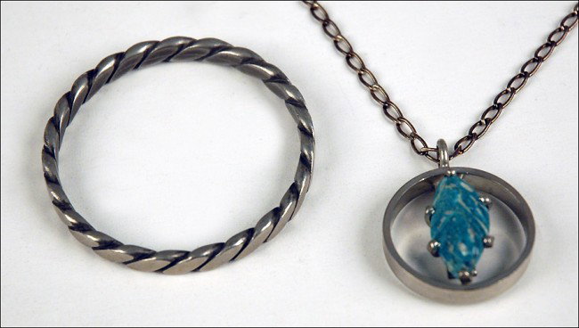 GEORG JENSEN PEWTER PENDANT AND BRACELET.: GEORG JENSEN PEWTER PENDANT AND BRACELET.