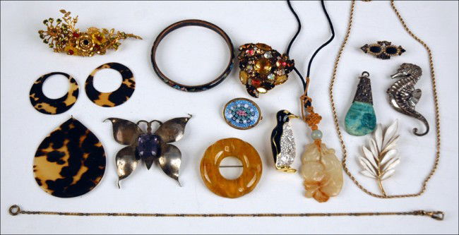 MIRIAM HASKELL FLORAL SPRAY RHINESTONE BROOCH.: MIRIAM HASKELL FLORAL SPRAY RHINESTONE BROOCH. Together with a Coro sterling silver seahorse brooch, a Kramer rhinestone brooch, a Trifari white enamel brooch, a Swarovski enamel and rhinestone pengui