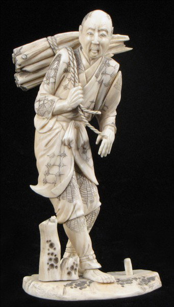 CARVED IVORY FIGURE OF A FARMER.: CARVED IVORY FIGURE OF A FARMER. Height: 6.5"