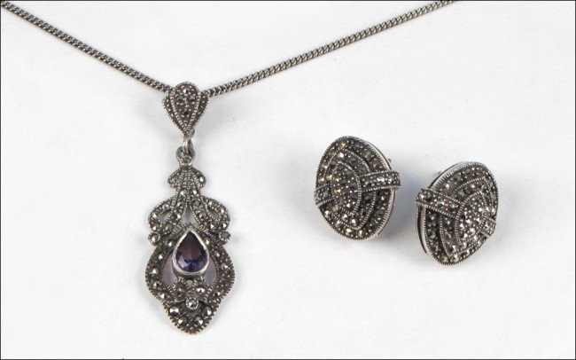 PAIR OF STERLING SILVER AND MARCASITE POST EARR: PAIR OF STERLING SILVER AND MARCASITE POST EARRINGS. Together with a sterling silver, amethyst, and marcasite pendant
