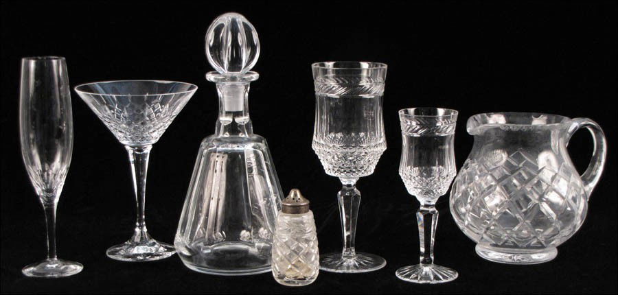 GALWAY CRYSTAL STEMWARE SERVICE.: GALWAY CRYSTAL STEMWARE SERVICE. Comprised of six water goblets, and six wine goblets. Together with eight Orrefors crystal champagne flutes, one Baccarat crystal decanter, two cystal martini glasses,