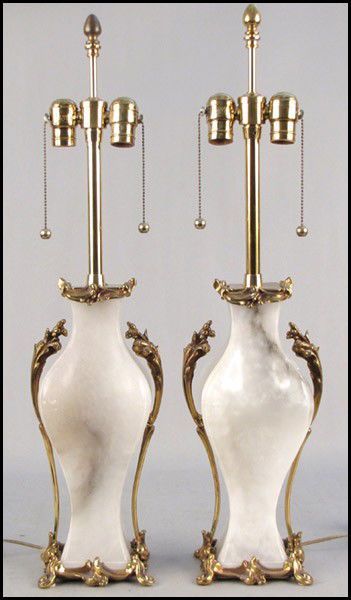 PAIR OF MARBRO CARVED ALABASTER TABLE LAMPS.: PAIR OF MARBRO CARVED ALABASTER TABLE LAMPS. Height: 24"
