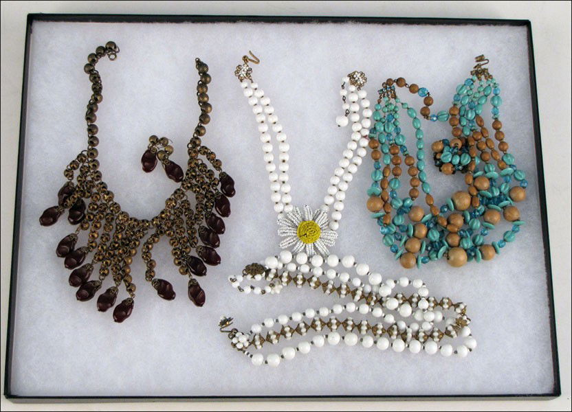 MIRIAM HASKELL SEED BEAD FLOWER NECKLACE.: MIRIAM HASKELL SEED BEAD FLOWER NECKLACE. Together with a Miriam Haskell three strand bead necklace, a Eugene wood and faux turquoise bead necklace, and an unsigned bakelite bib necklace and pair of w
