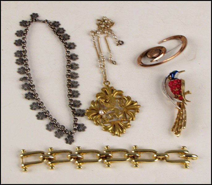 MARCEL BOUCHER ENAMEL AND RHINESTONE BIRD BROO: MARCEL BOUCHER ENAMEL AND RHINESTONE BIRD BROOCH. Together with a Richelieu faux pearl griffin necklace, a Renoir copper brooch, a silvered metal floret necklace, and a gold tone bracelet