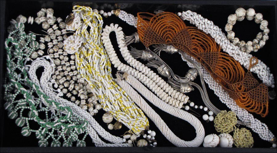 GROUP OF SEED BEAD JEWELRY.: GROUP OF SEED BEAD JEWELRY. Compriesd of necklaces, earclips, and bracelets