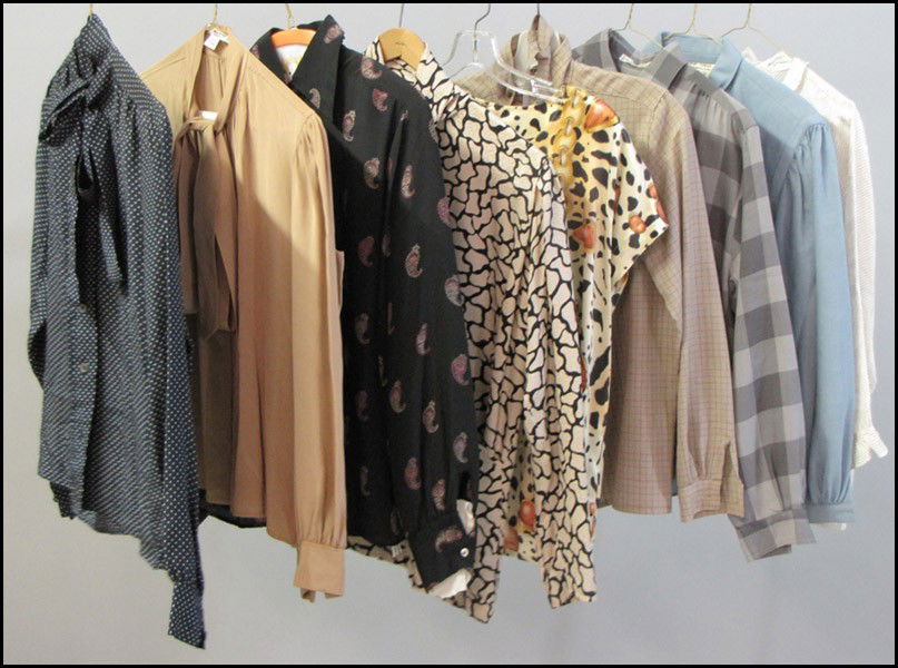 GROUP OF SILK AND COTTON BLOUSES.: GROUP OF SILK AND COTTON BLOUSES. Including Yves Saint Laurent, Valentino, Guy Laroche, Escada, and others