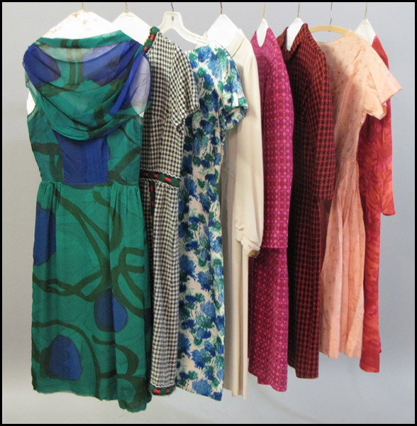 GROUP OF SILK, WOOL, AND CHIFFON DAY DRESSES.: GROUP OF SILK, WOOL, AND CHIFFON DAY DRESSES. With dresses by Marshall Fields, Bob Meyer, Blum's Vogue, and others