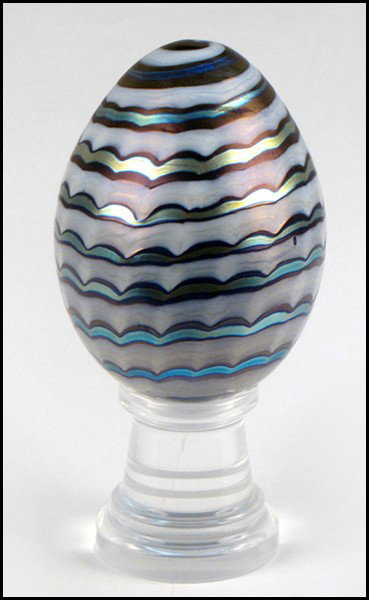 VANDERMARK IRIDESCENT GLASS EGG.: VANDERMARK IRIDESCENT GLASS EGG. Underside is signed and dated 1977 Egg height: 5"