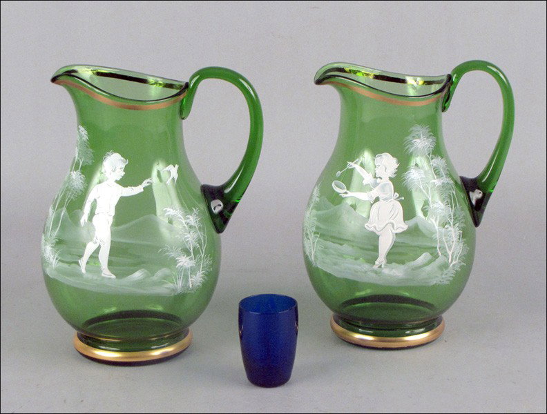 TWO MARY GREGORY STYLE ENAMELLED GLASS PITCHER: TWO MARY GREGORY STYLE ENAMELLED GLASS PITCHERS. Together with a similar cobalt glass cup