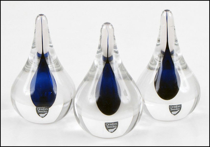 SET OF THREE ORREFORS GLASS PAPERWEIGHTS.: SET OF THREE ORREFORS GLASS PAPERWEIGHTS. Height: 4.25"