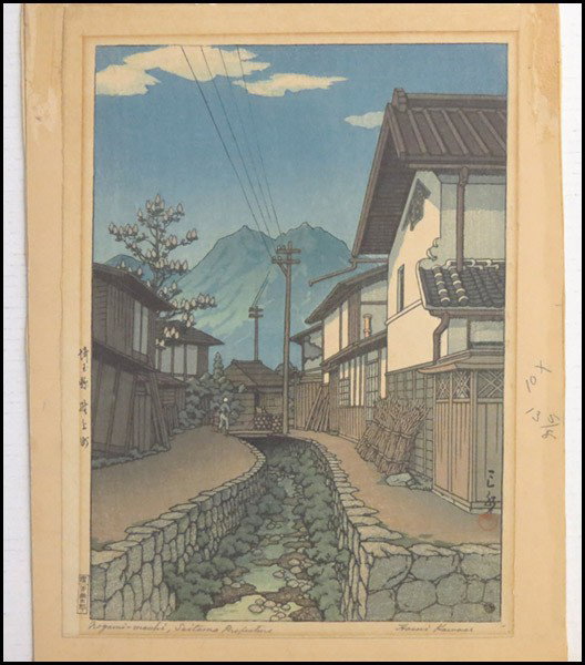 KAWASE HASUI (JAPANESE 1883-1957) NOGAMI-MACHI: KAWASE HASUI (JAPANESE 1883-1957) NOGAMI-MACHI, SAITAMA PREFECTURE. Color woodblock, signed and titled in pencil in the lower margin, published by Watanabe Shozaburo; Unframed - loose sheet affixed to