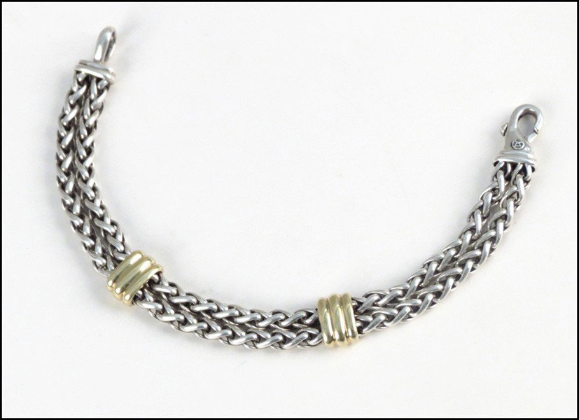 DAVID YURMAN 18 KARAT YELLOW GOLD AND STERLING: DAVID YURMAN 18 KARAT YELLOW GOLD AND STERLING SILVER BRACELET. Cable classics, double wheat chain bracelet Length: 8.5"