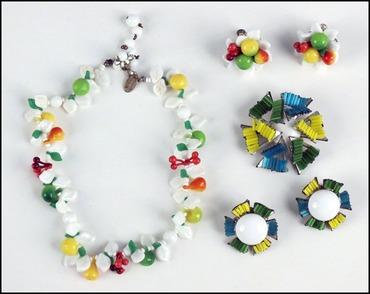 TWO MIRIAM HASKELL DEMI-PARURES.: TWO MIRIAM HASKELL DEMI-PARURES. Comprised of one bugle bead brooch with earclips, and one fruits necklace and pair of earclips