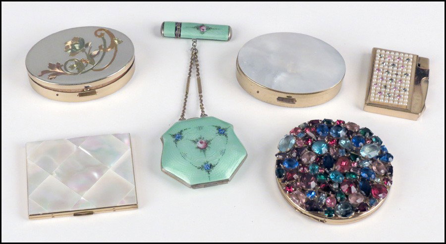 FOUR ELGIN AMERICAN COMPACTS.: FOUR ELGIN AMERICAN COMPACTS. Together with a Marathon enamel compact & lipstick, and an Elgin American lighter