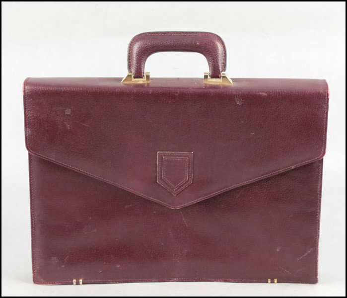 YVES SAINT LAURENT LEATHER BRIEFCASE.: YVES SAINT LAURENT LEATHER BRIEFCASE. 12" x 17"