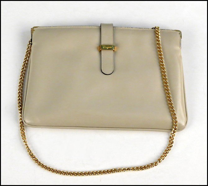 SALVATORE FERRAGAMO CREAM LEATHER HANDBAG.: SALVATORE FERRAGAMO CREAM LEATHER HANDBAG. With a retractable strap 7" x 10"