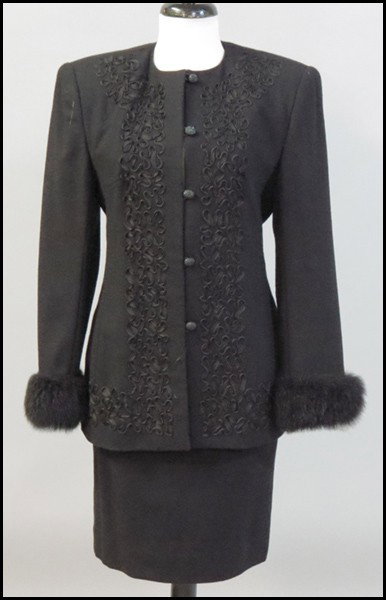 BLACK WOOL CREPE EVENING ENSEMBLE.: BLACK WOOL CREPE EVENING ENSEMBLE. Comprised of a skirt and jacket with fur cuffs