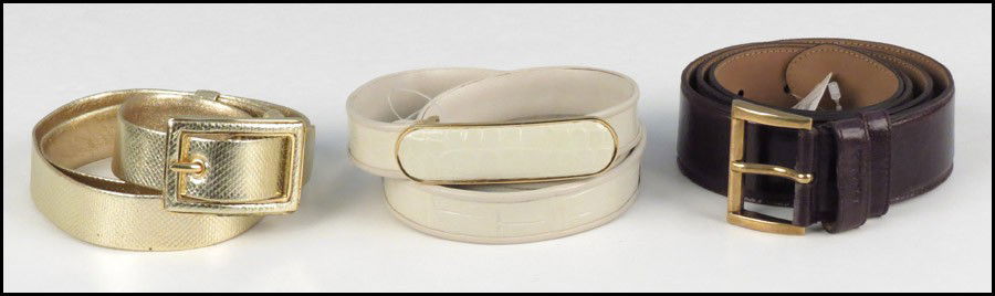 PRADA DARK PURPLE LEATHER BELT.: PRADA DARK PURPLE LEATHER BELT. Together with a Judith Leiber gold leather belt, and a white Judith Leiber belt