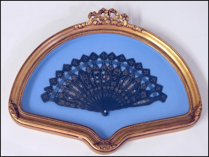 VICTORIAN LACQUERED, PAINTED AND PARCEL GILT D: VICTORIAN LACQUERED, PAINTED AND PARCEL GILT DECORATED FAN. In giltwood shadow box 17"x22"