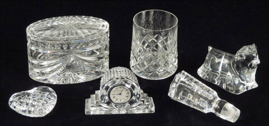GROUP OF WATERFORD CRYSTAL TABLE ARTICLES.: GROUP OF WATERFORD CRYSTAL TABLE ARTICLES. Comprising one covered box, one tumbler, one heart, one desk clock, and one decanter stopper. Together with a Baccarat crystal dog