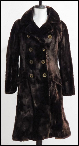 BROWN SHEARED BEAVER DOUBLE BREASTED COAT.: BROWN SHEARED BEAVER DOUBLE BREASTED COAT. Approximately a size 4