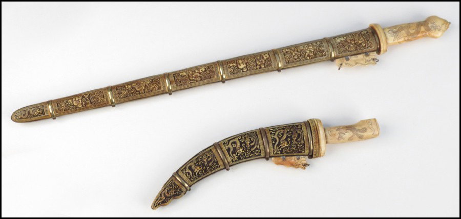 CARVED BONE SWORD AND SCABBARD.: CARVED BONE SWORD AND SCABBARD. Together with a carved bone dagger and scabbard Sword length: 34.5"