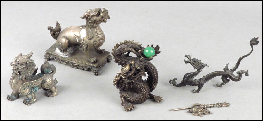PATINATED BRONZE DRAGON.: PATINATED BRONZE DRAGON. Holding a green jade ball. Together with three metal animals, and a metal decorative object