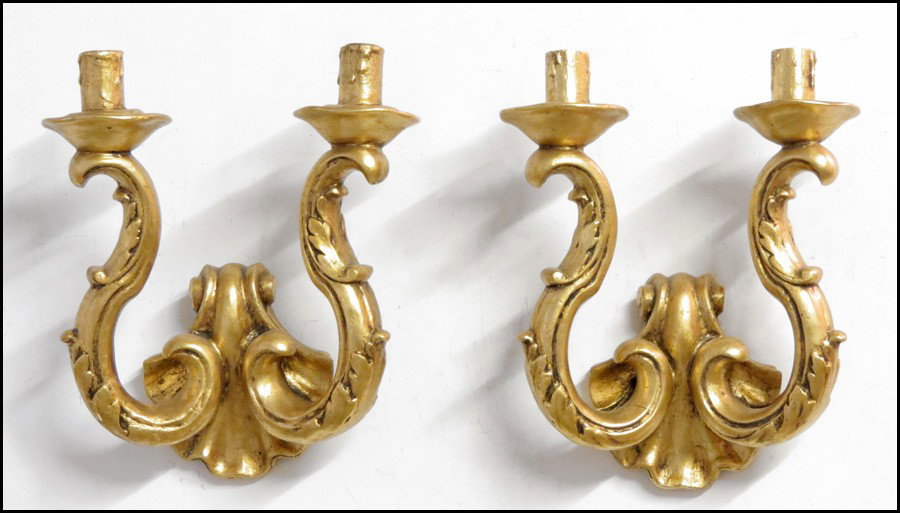 PAIR OF GILT PLASTER TWO-LIGHT SCONCES.: PAIR OF GILT PLASTER TWO-LIGHT SCONCES. Not electrified H: 12" W: 11" D: 4"