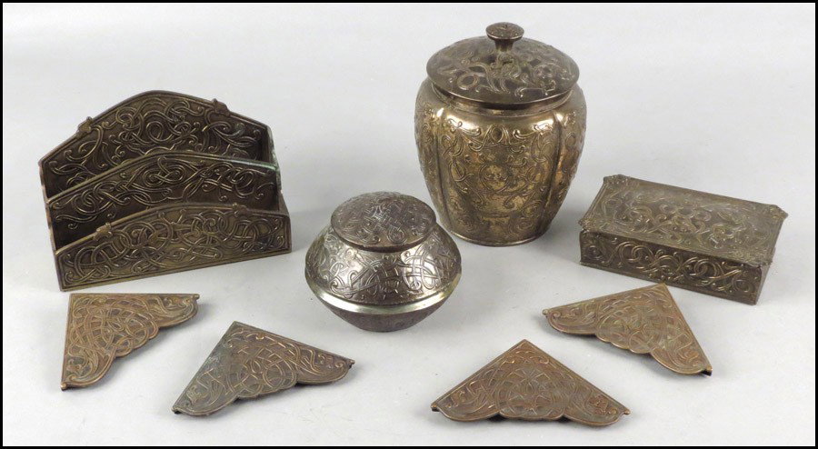 MARSHALL FIELD & CO., GILT BRONZE DESK SET.: MARSHALL FIELD & CO., GILT BRONZE DESK SET. In a Celtic knot motif. Comprised of a set of four blotters, letter stand, inkwell, letter box, and covered barrel