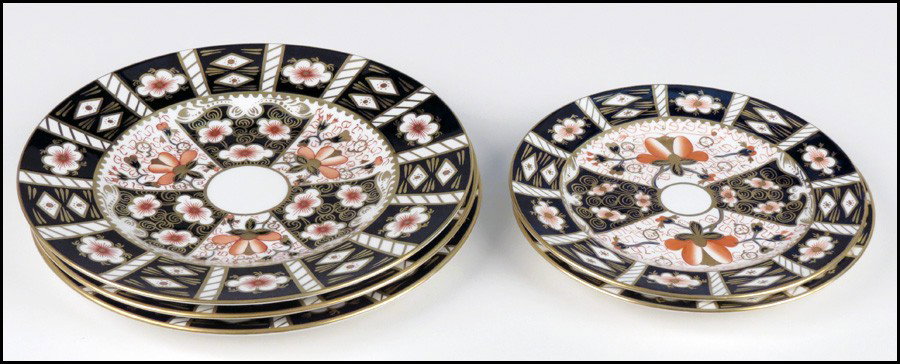 ROYAL CROWN DERBY PORCELAIN PARTIAL TABLE SERV: ROYAL CROWN DERBY PORCELAIN PARTIAL TABLE SERVICE. Traditional "Double Diamond" Imari pattern, 2451. Comprised of three dinner plates (diameter: 10.25"), and two salad plates (diameter: 8.5")
