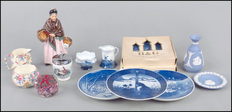COLLECTION OF DECORATIVE ITEMS.: COLLECTION OF DECORATIVE ITEMS. Comprised of a Royal Doulton figure of The Orange Lady, HN1759, four Bing & Grondahl collector plates, one Royal Copenhagen collector plate, Wedgwood jasperware vase an