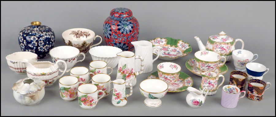 MINTON PORCELAIN TABLE SERVICE IN THE COCKATRI: MINTON PORCELAIN TABLE SERVICE IN THE COCKATRICE PATTERN. Comprised of a teapot, creamer, sugar bowl, one teaup, one saucer, one tea plate, and one dish.Together with a Wood & Sons Chung ginger jar, a