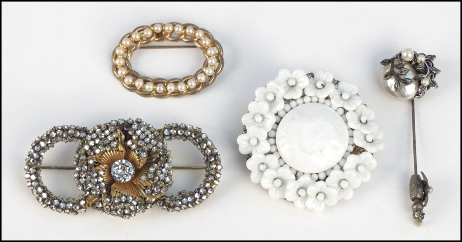 MIRIAM HASKELL RHINESTONE BROOCH.: MIRIAM HASKELL RHINESTONE BROOCH. Together with a Miriam Haskell faux pearl oval brooch, a Miriam Haskell white bead floral brooch, and a Miriam Haskell faux pearl stick pin