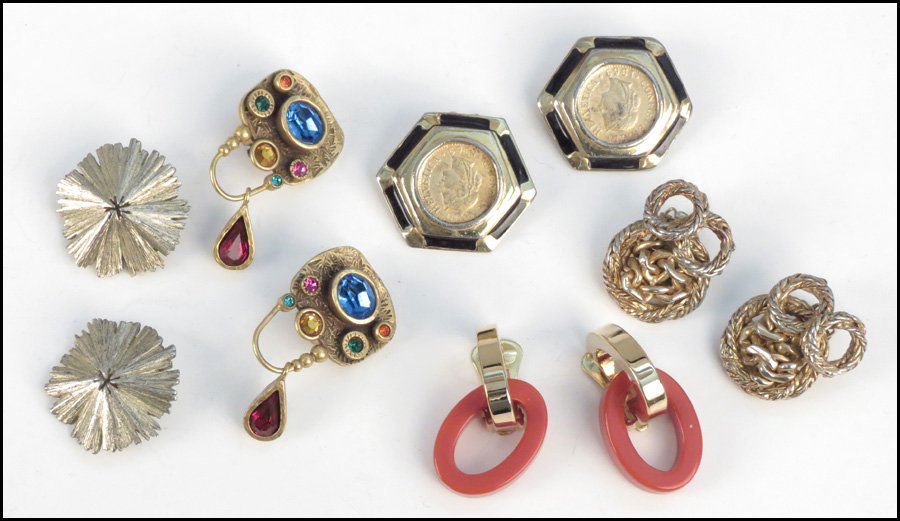 FIVE PAIRS OF SIGNED EARCLIPS.: FIVE PAIRS OF SIGNED EARCLIPS. Comprised of one pair of Salvatore Ferragamo gold tone and plastic double loop earclips, one pair of Hattie Carnegie rope twist earclips, one pair of Patricia Locke earc