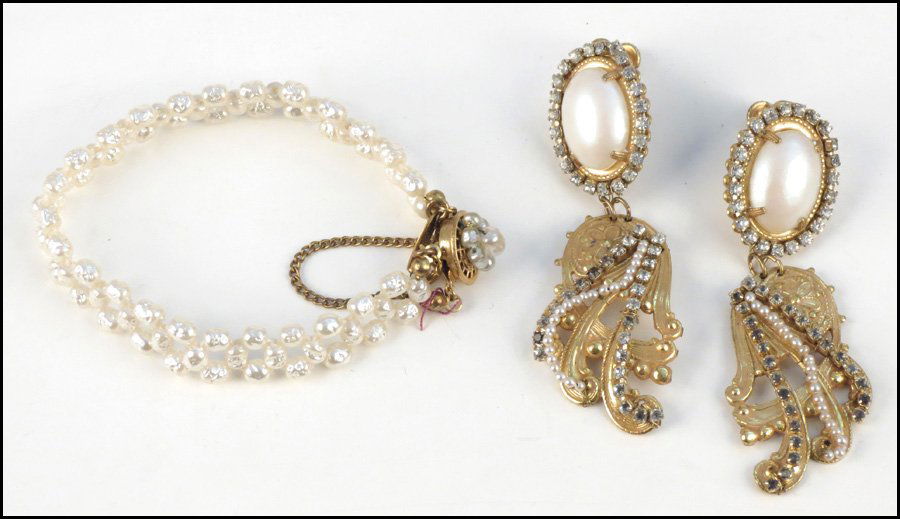PAIR OF MIRIAM HASKELL FAUX PEARL AND RHINESTON: PAIR OF MIRIAM HASKELL FAUX PEARL AND RHINESTONE DROP EARCLIPS. Together with a Miriam Haskell faux pearl bracelet Bracelet length: 7.25"