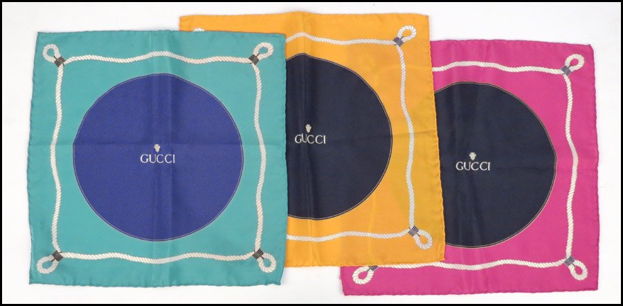 THREE GUCCI SILK POCKET SQUARES.: THREE GUCCI SILK POCKET SQUARES. 12" x 12"