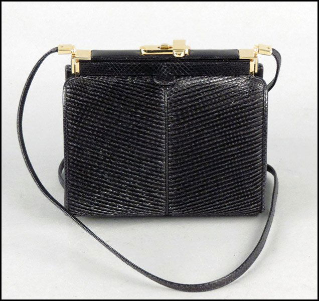 JUDITH LEIBER REPTILE SKIN HANDBAG.: JUDITH LEIBER REPTILE SKIN HANDBAG. With hand mirror and comb Handbag: 5" x 6.25" x 3"