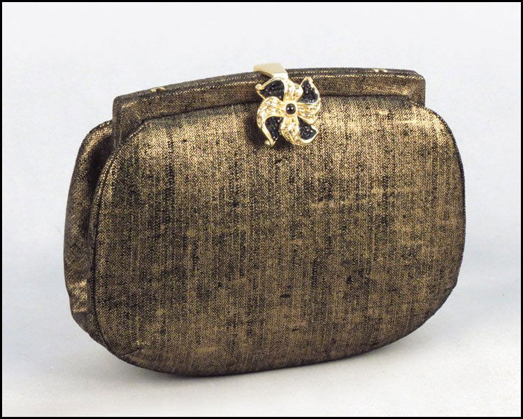 JUDITH LEIBER CLUTCH HANDBAG.: JUDITH LEIBER CLUTCH HANDBAG. With a rhinestone star closure, and coin purse 5.5" x 7.5"