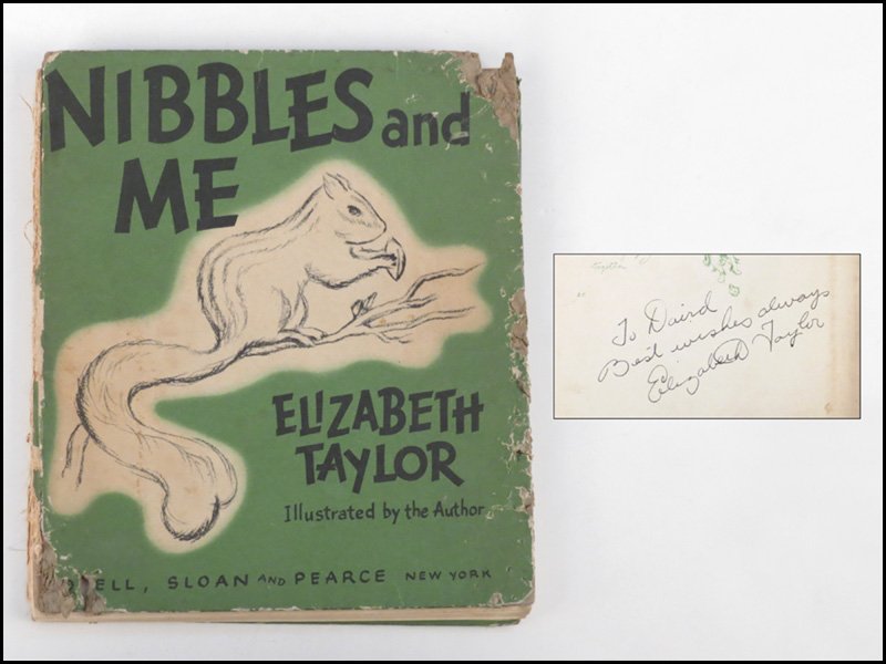 A SIGNED COPY OF NIBBLES AND ME BY ELIZABETH T: A SIGNED COPY OF NIBBLES AND ME BY ELIZABETH TAYLOR. Dedicated and Signed in black pen 'To David Best wishes always Elizabeth Taylor' 8" x 7"